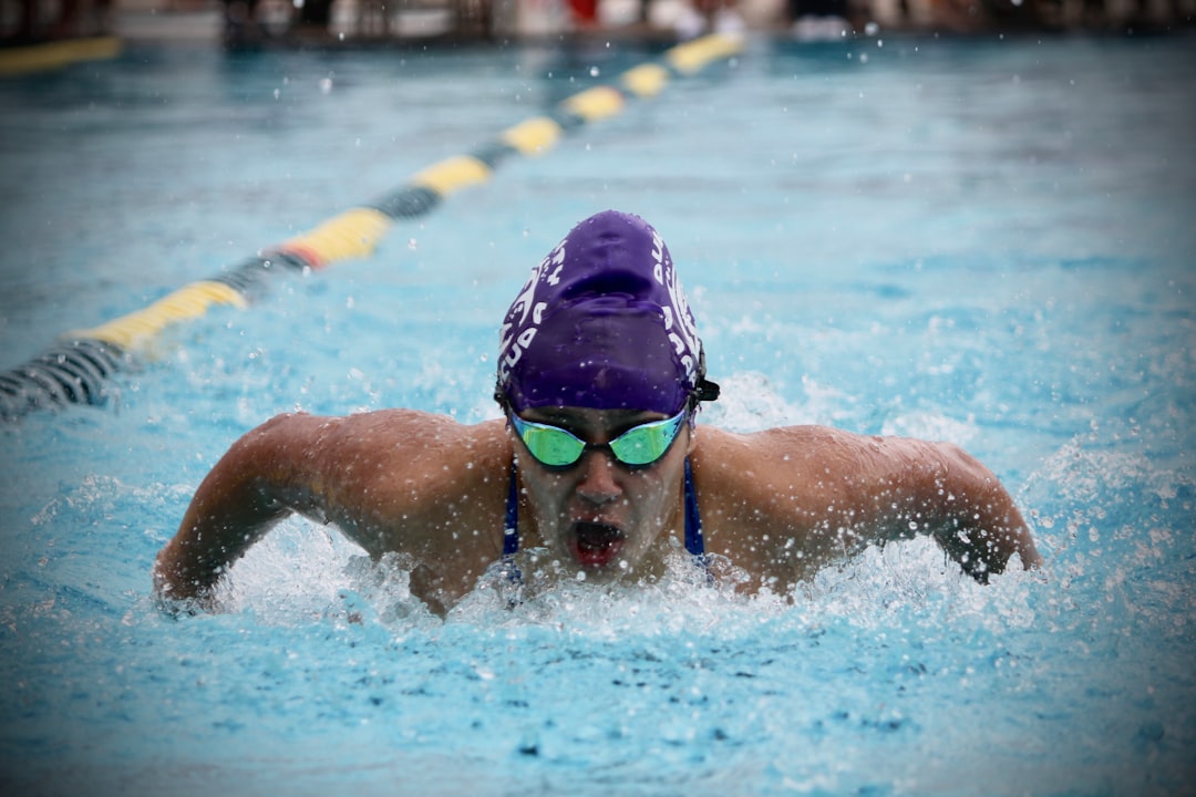 person-in-swimming-goggles-in-water-fiyz-enyf8k